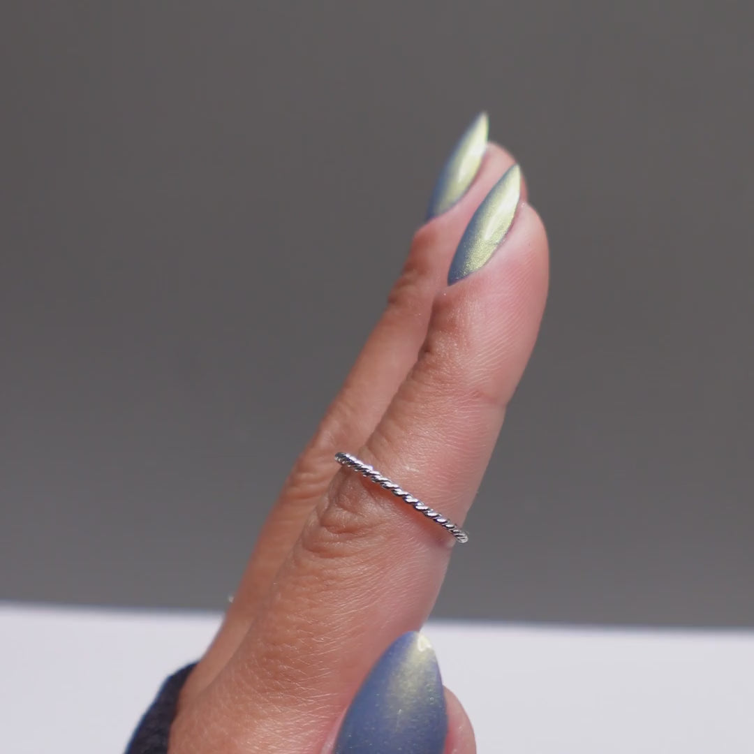 Greenstone nail powder — finished nails moving to show the finish